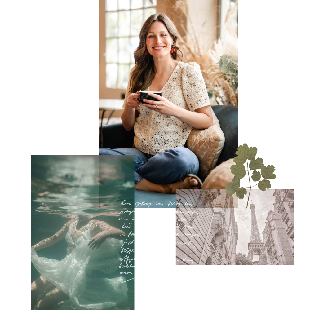 A woman with long brown hair, wearing a cream lace blouse, smiling and holding a black mug, sitting on a sofa with decorative pillows, in a well-lit cozy room with plants and a window.