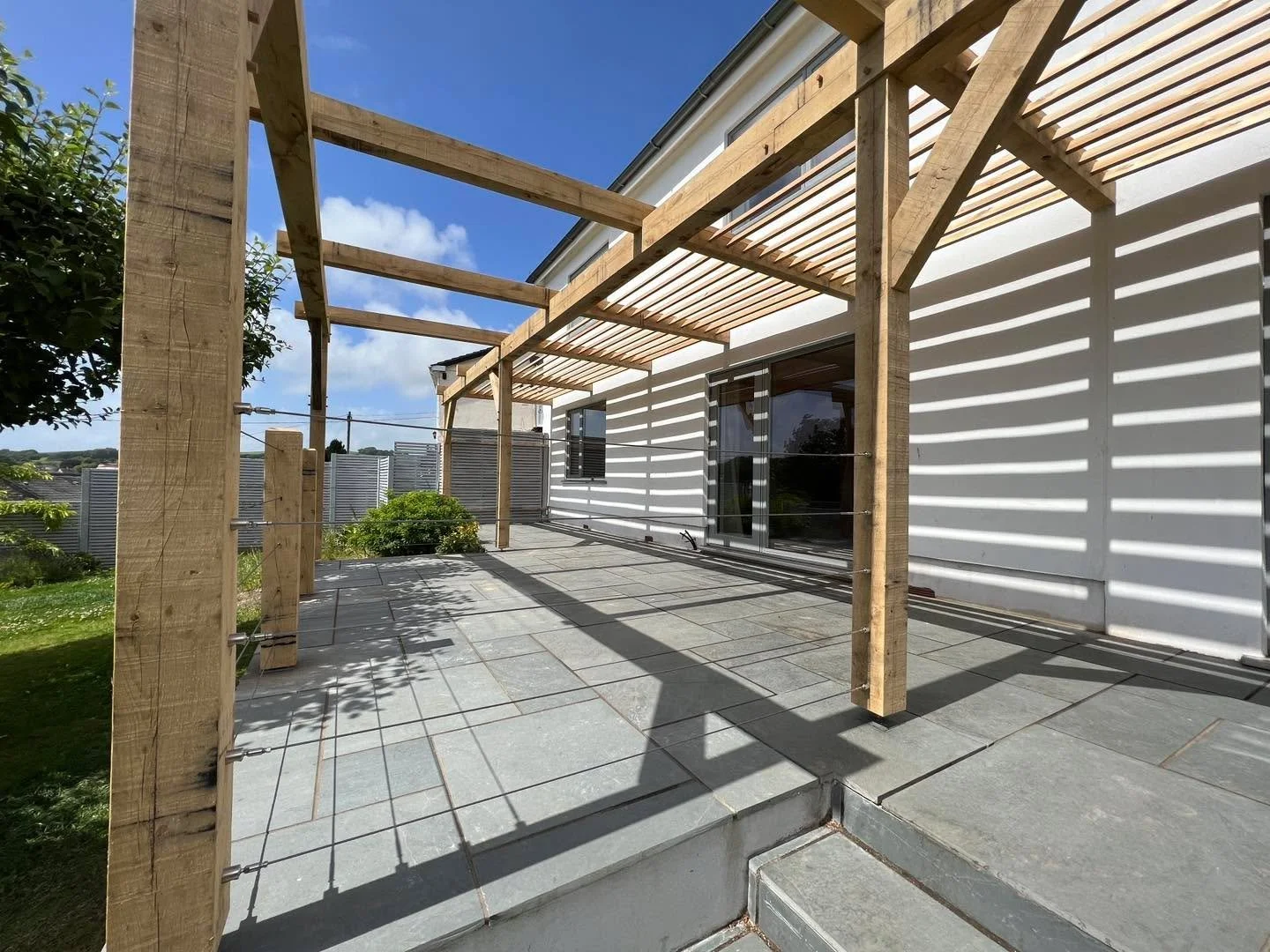 Outdoor areas can sometimes seem unwelcoming at this time of year with the constant battering of the weather. It can be hard to imagine the same space being relaxed, cosy, inspiring but in fact often its possible to transform a patio or deck area by 