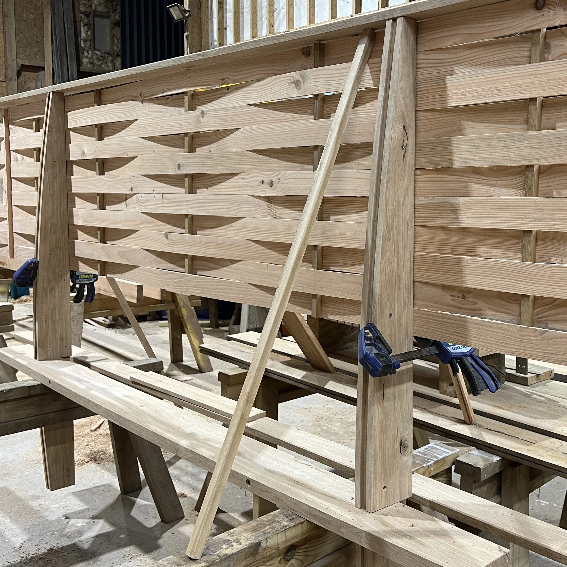 Bespoke woven Chestnut screen being made in workshop with architectural detailing