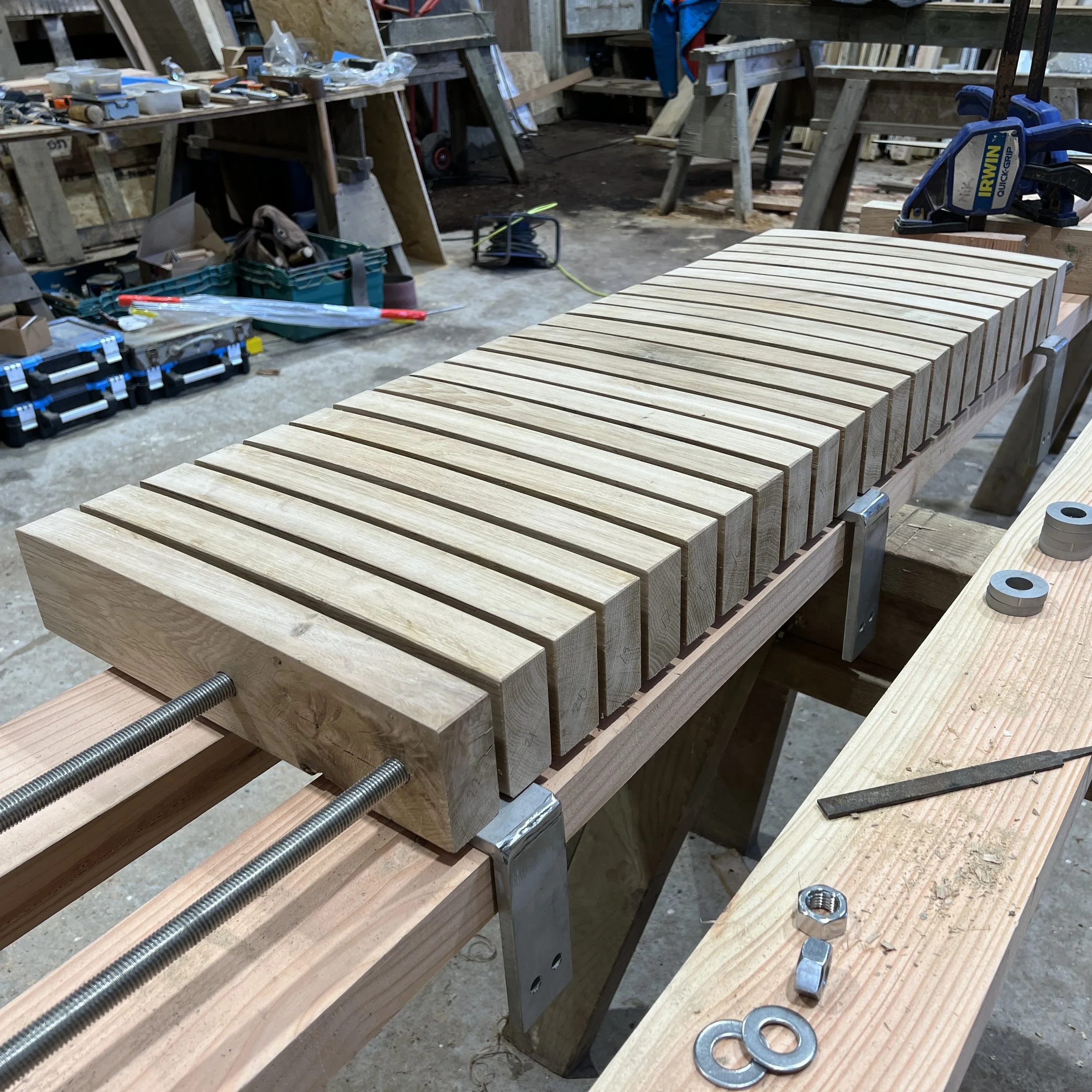 Bespoke Oak seating being made in Devon workshop with stainless fixings
