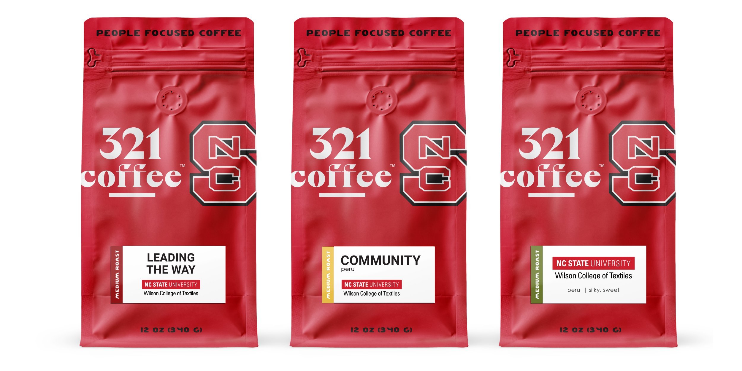 3 custom co-branded bags of coffee are shown next to each other. Each is red with the NC State logo.