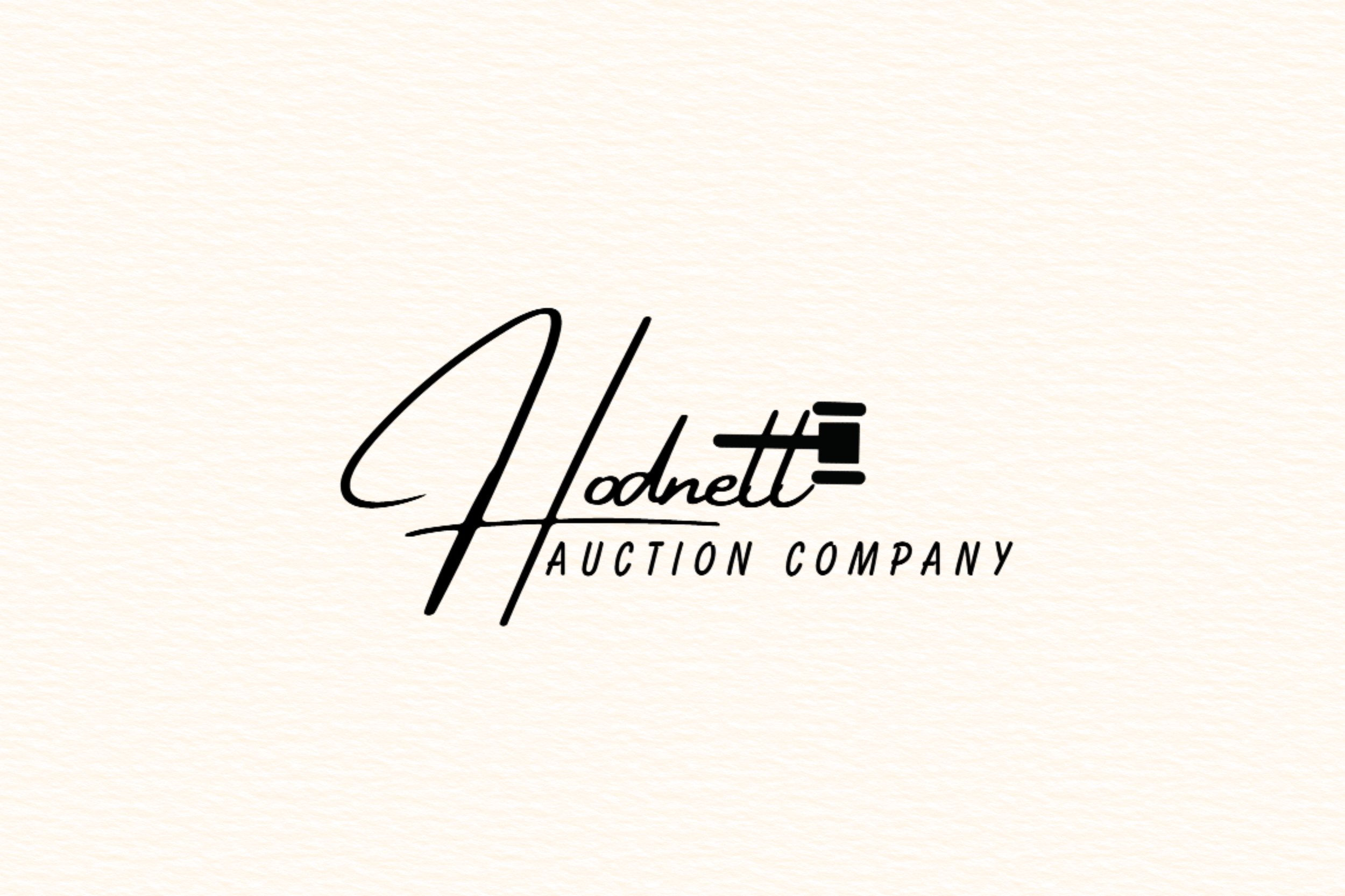 Logo for Haddett Auction Company with stylized text and a small hammer icon.