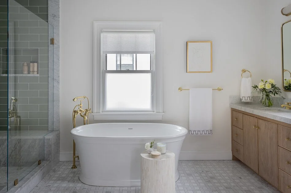 Luxury home builders in Eastern Massachusetts renovate bathroom in historic Brookline home as part of a detailed remodel project.