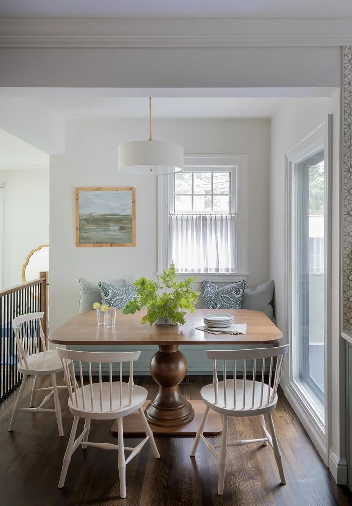 Custom home builder in Boston area renovates kitchen in historic Brookline home, combining preserved millwork with contemporary design elements.