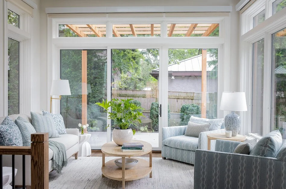 Sunroom by luxury home builders in Eastern Massachusetts as part of a renovation at a historic home in Brookline.