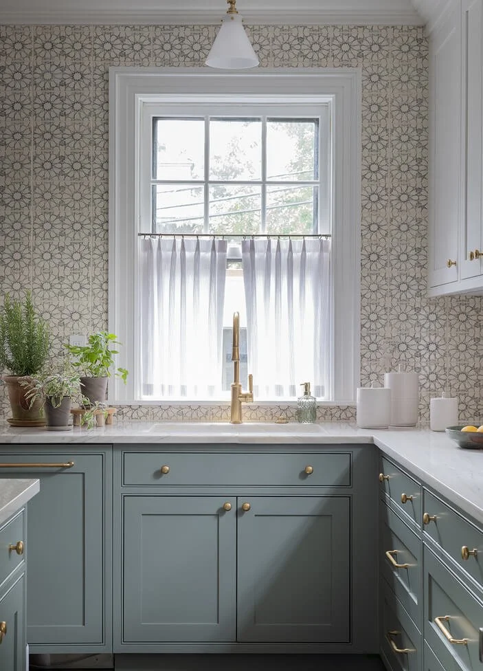 Kitchen renovation in historic Brookline home by custom home builder in the Boston area, merging classic charm with modern luxury features.