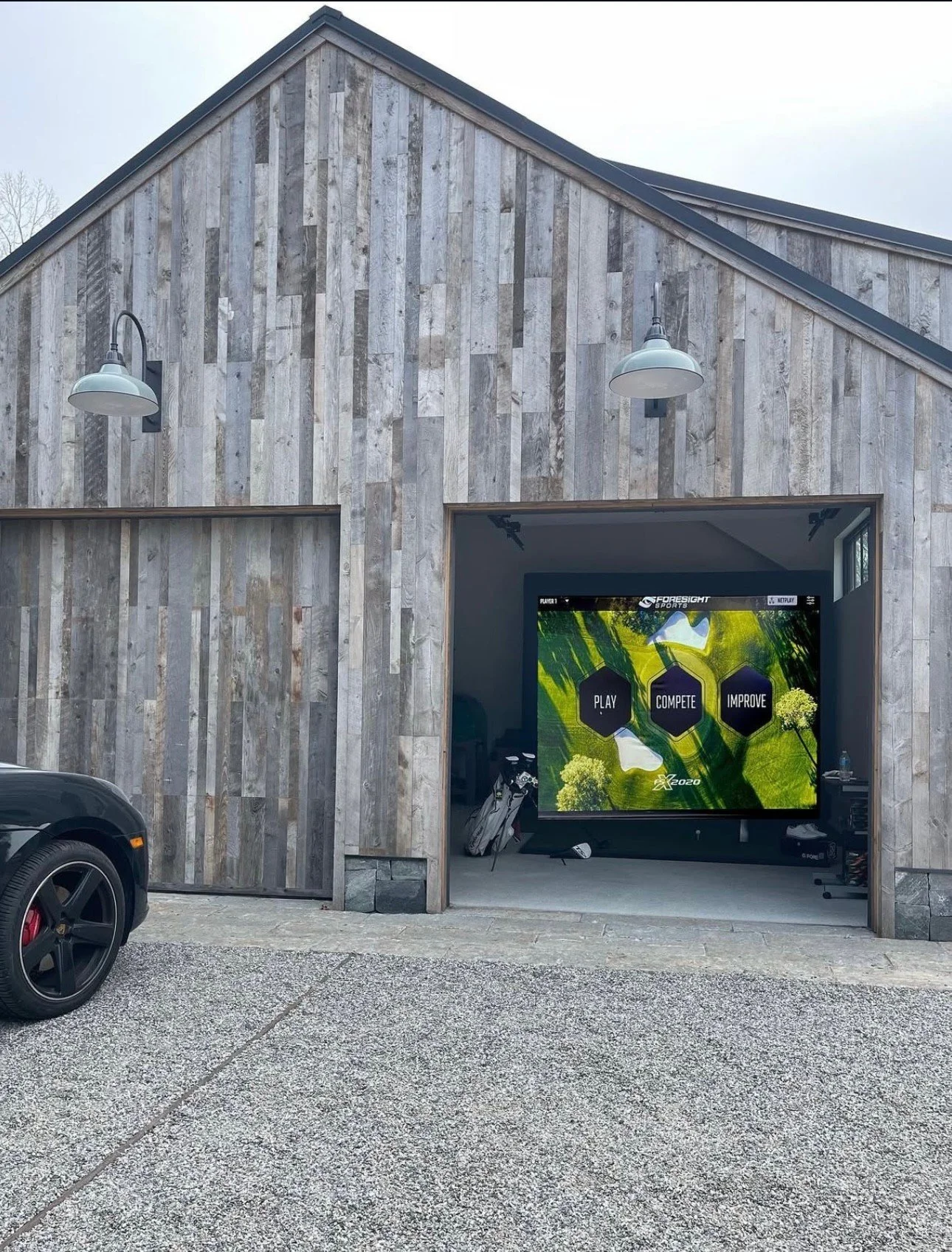 No matter the season, these homeowners can keep their swing sharp year-round with this garage golf simulator, built in collaboration with @foresightsports for our Silver Hill project. Whether it&rsquo;s a request from the architect, designer, or home