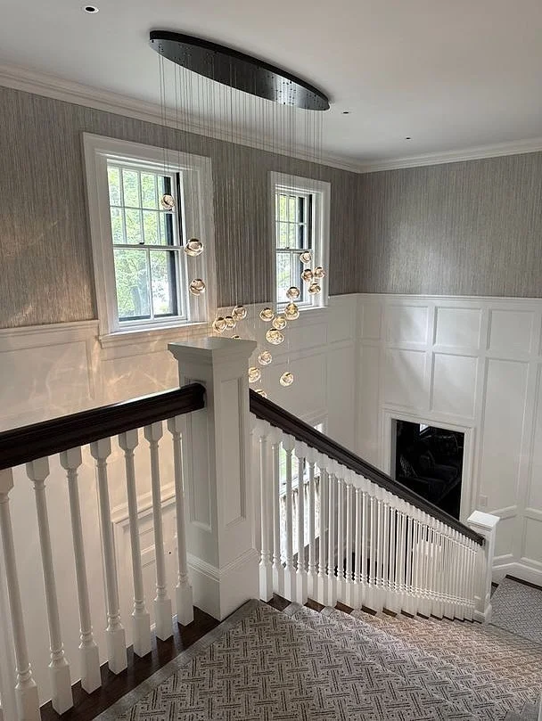 Making the impossible possible, one scaffold and ladder at a time. For this beautiful Brookline home, we planned the installation, measured and positioned every support, coordinated access through tight spaces, and carefully lifted and secured this s