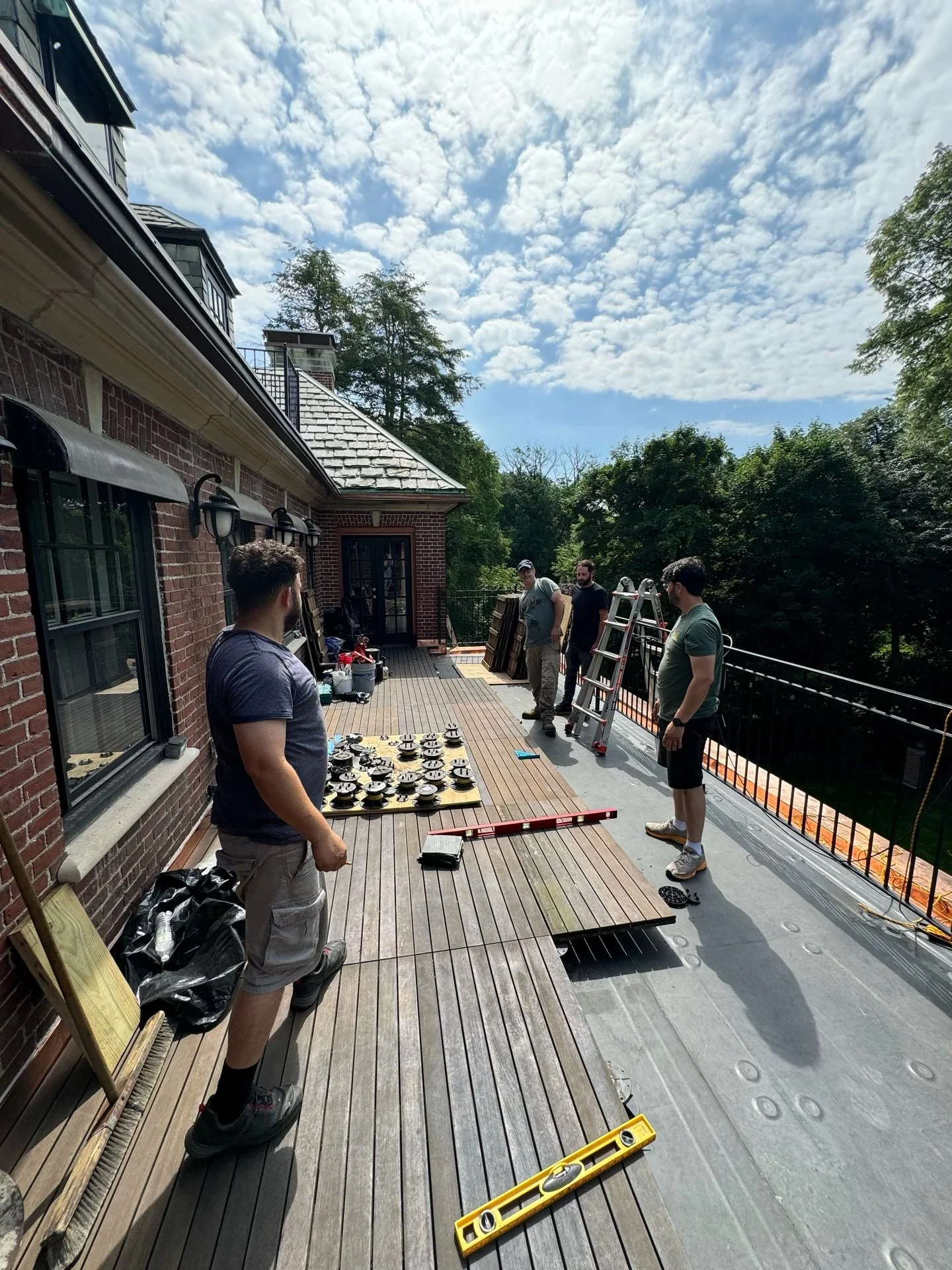 Throwing it back to warmer days, ideal for working on this second floor patio. We replaced the rubber roof and replicated original copper trough gutter work to restore performance while honoring the original architecture. 
&bull;
&bull;
&bull;
Constr