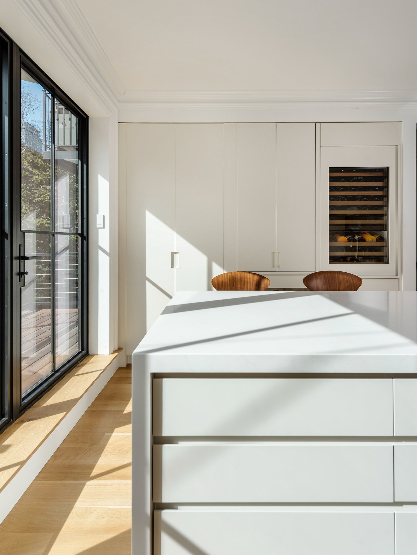 A sun filled kitchen and dining area in the South End. Every historic renovation we take on requires a different approach. Some center on careful replication, while others focus on restoring where necessary while introducing modern updates.

For this