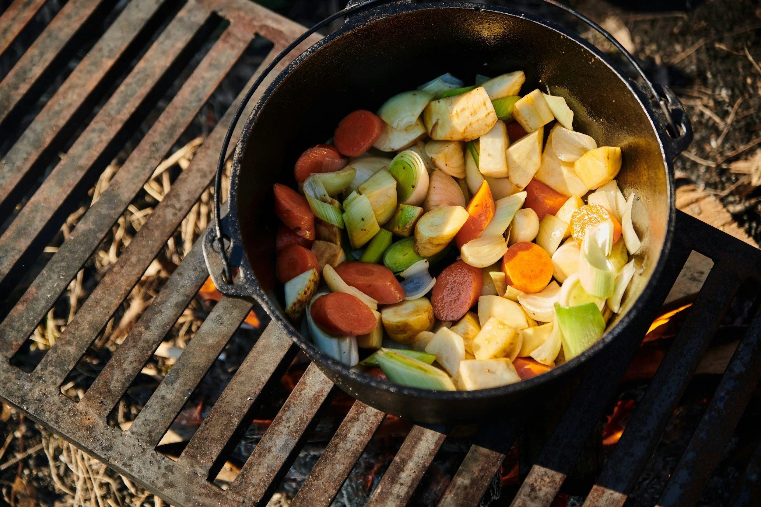 roasted vegetables in a cast iron pot