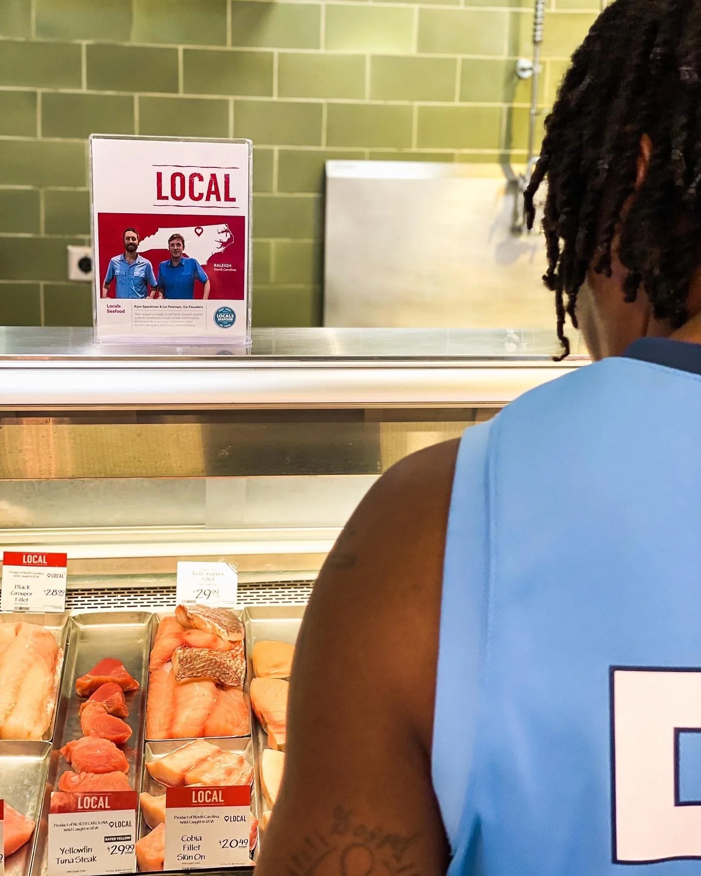 Chef Carl shopping for fish at a local seafood display