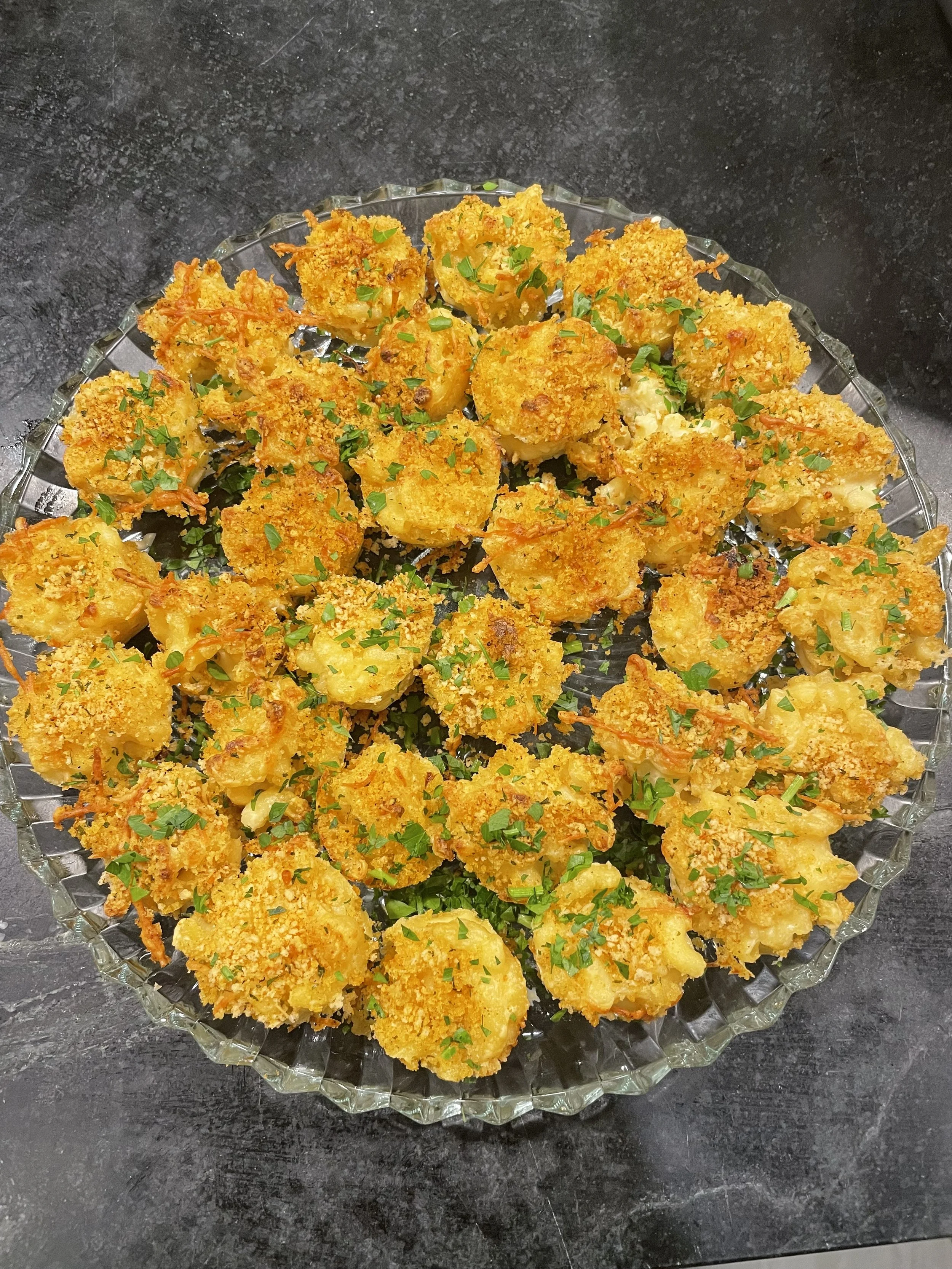 macaroni and cheese appetizers on a platter