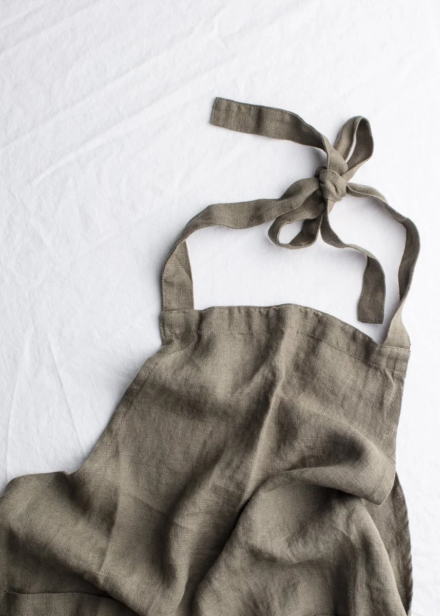 chef's apron on a table linen