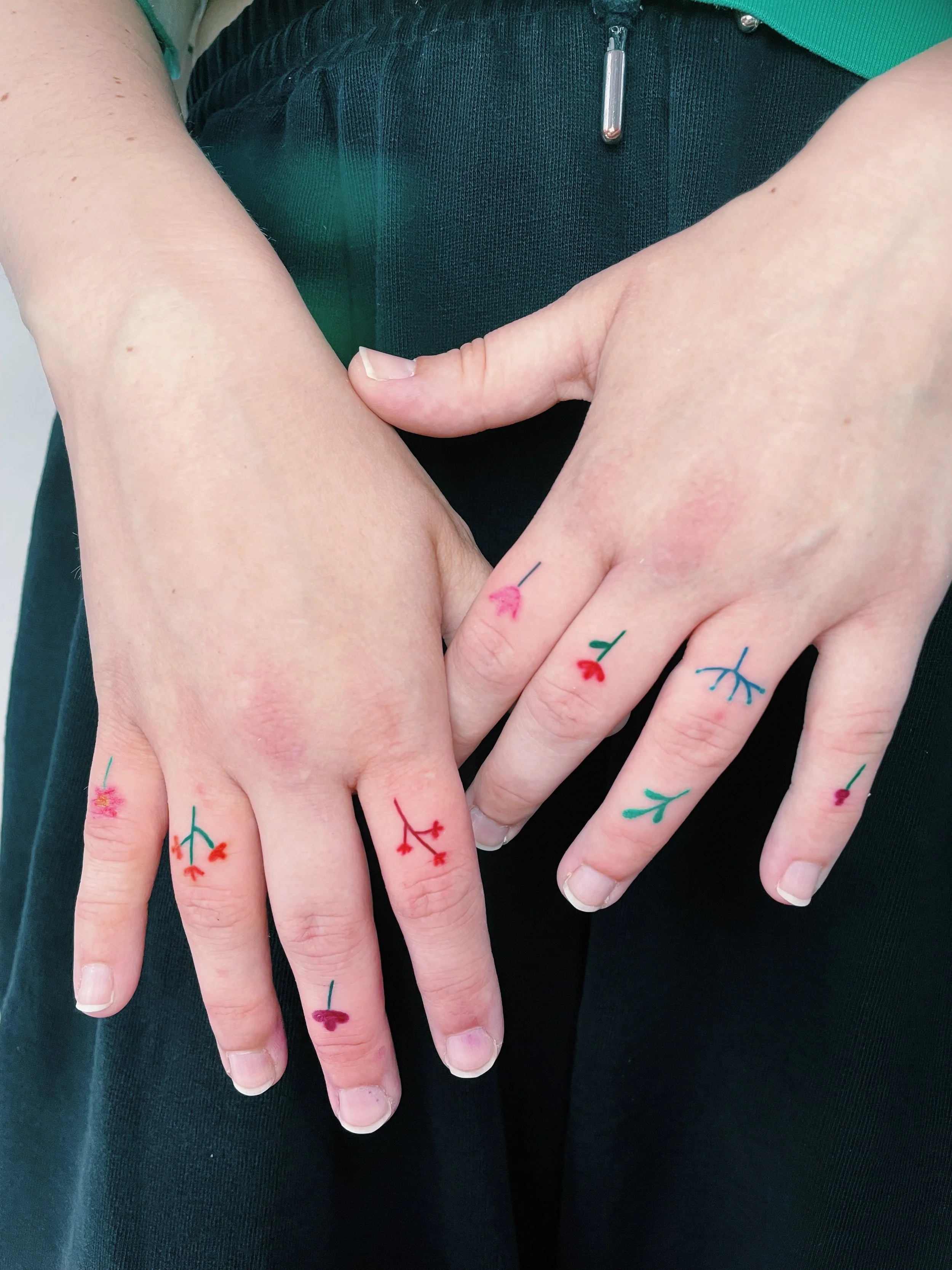 colorful fingers tattoos