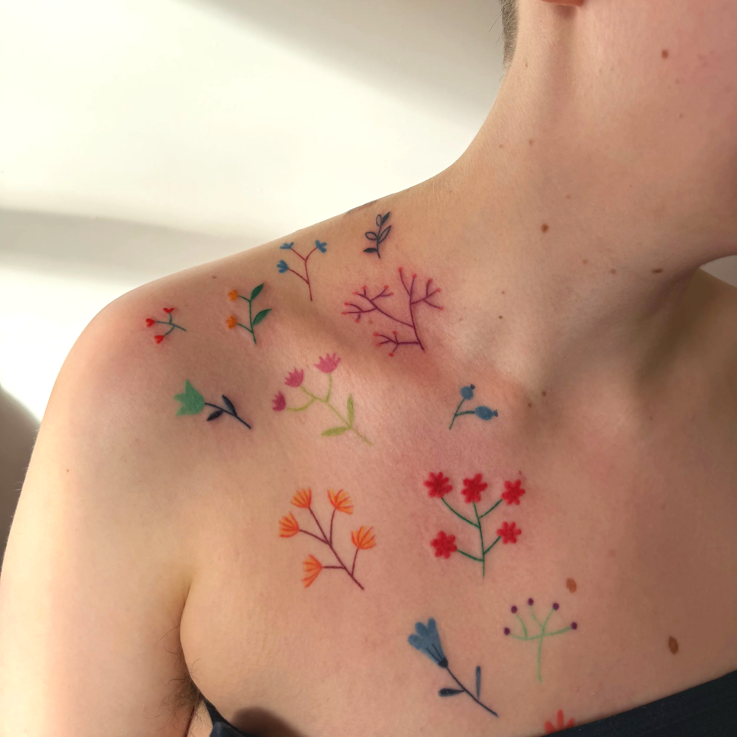a floral chest piece tattoo
