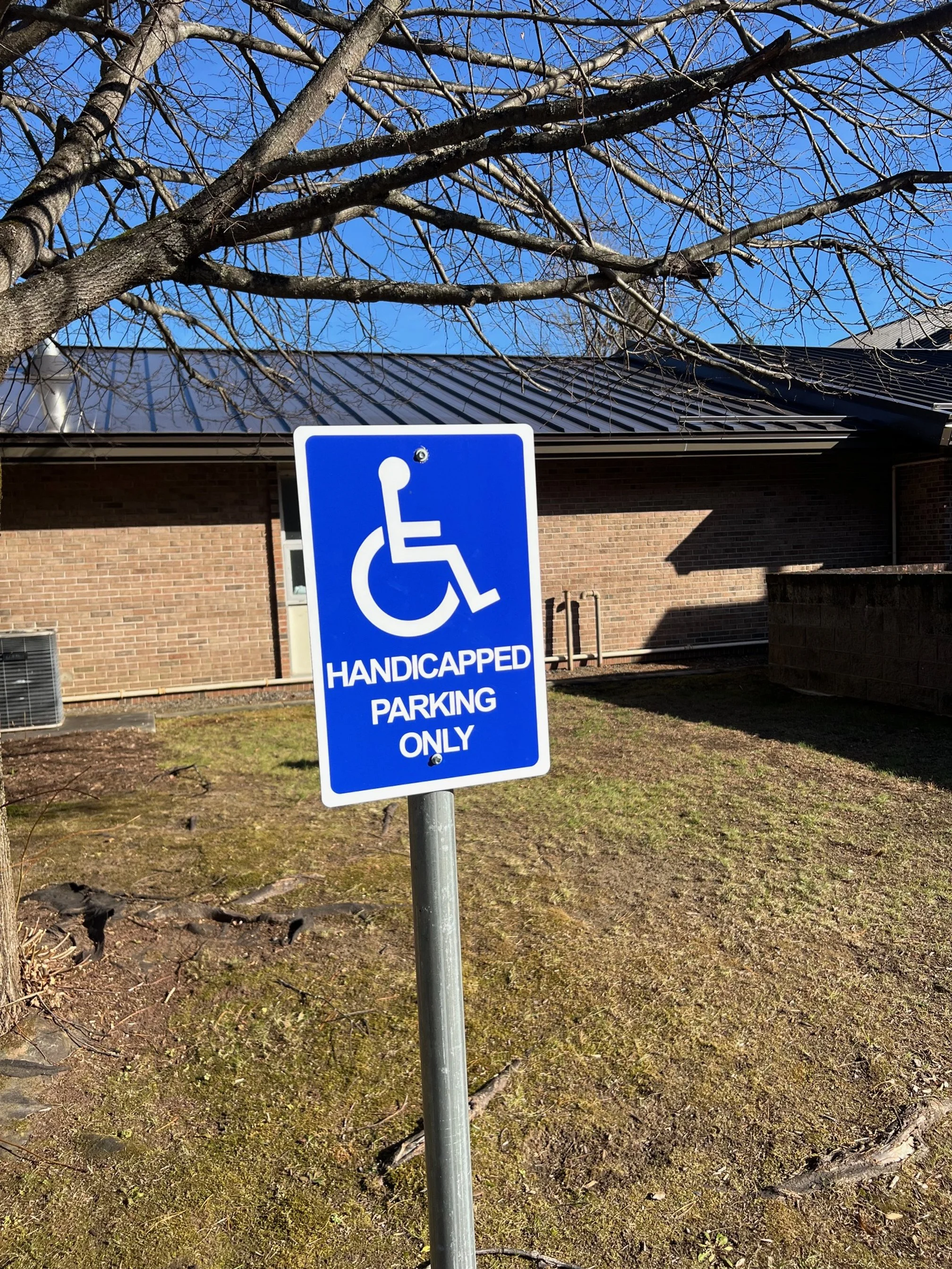 Handicapped sign install.jpg