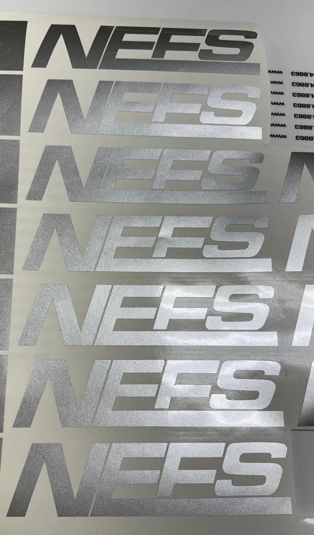 NEFS silver cut vinyl production.jpeg