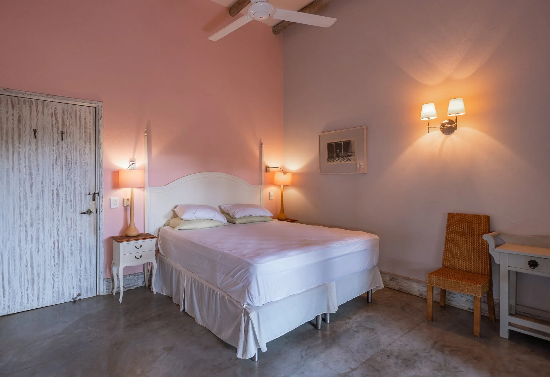 pink-walled-bedroom-with-double-bed.jpg