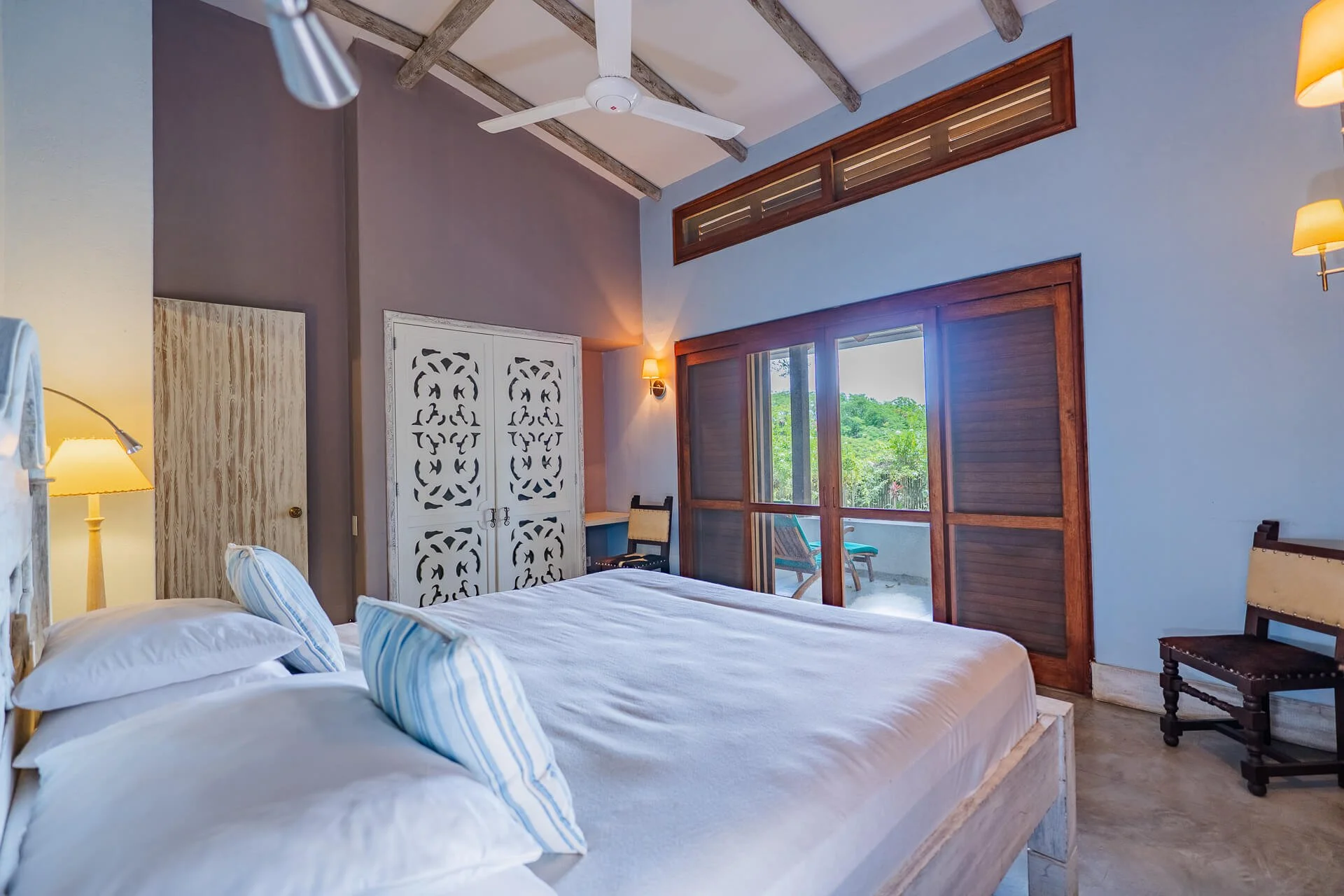 bedroom-with-king-size-bed- and-overhead-fan.jpg