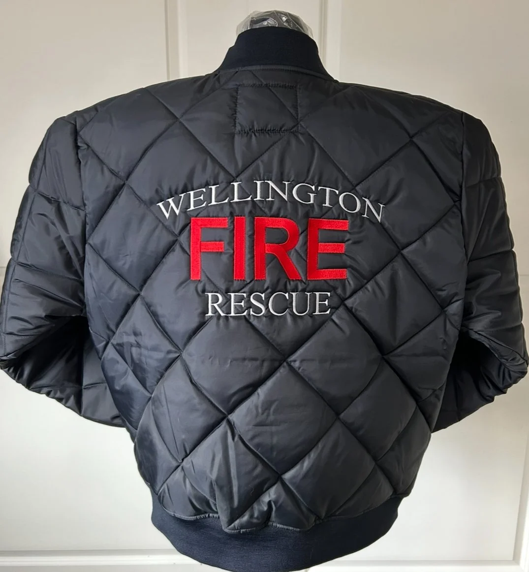 Winter jacket featuring custom embroidery for a fire department uniform.