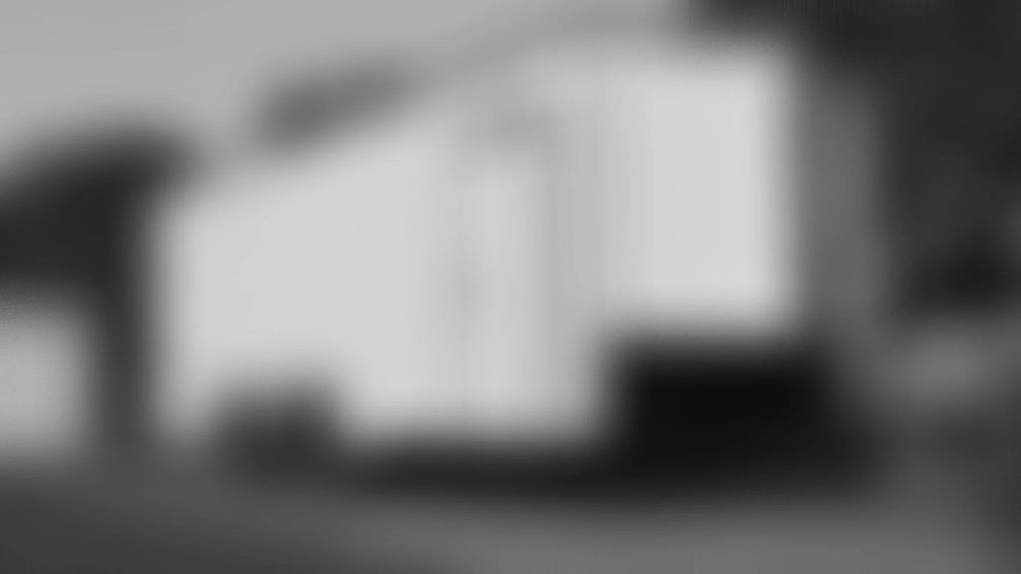 8.5x20 enclosed trailer rental near Charlotte NC — side and door view with blackout trim