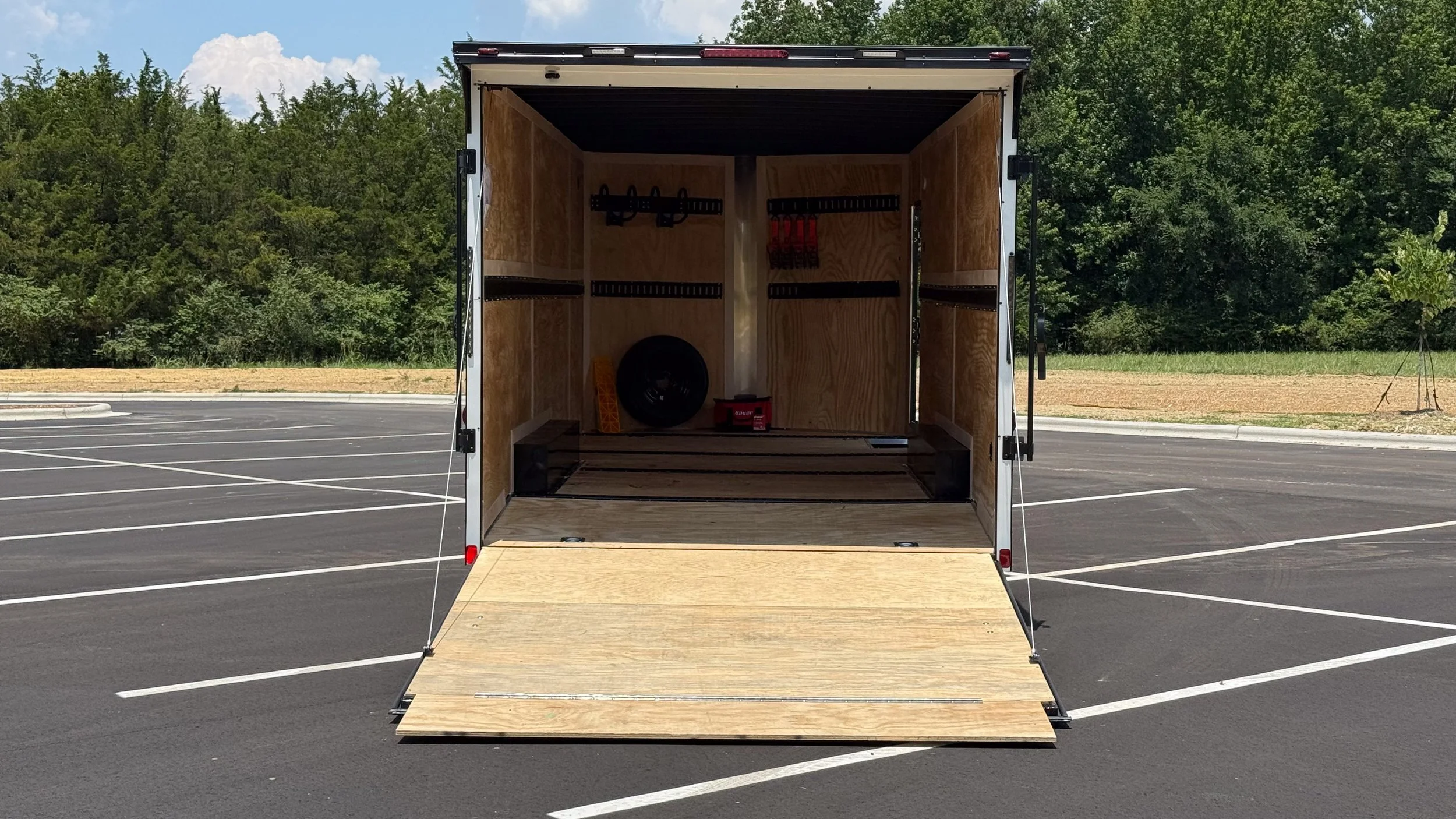 Enclosed trailer rental extra-wide rear ramp door opening — HitchOne Indian Trail NC
