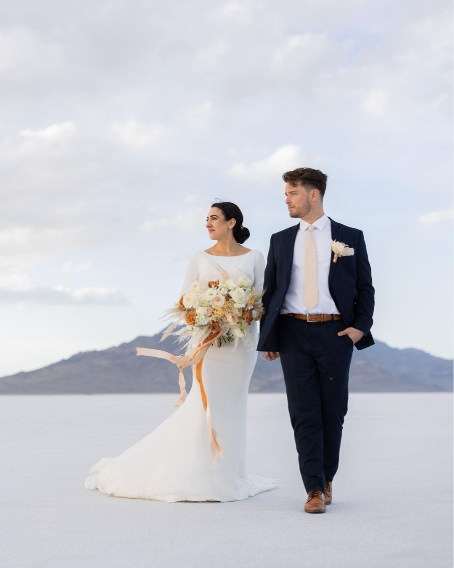 Groom wearing navy suit