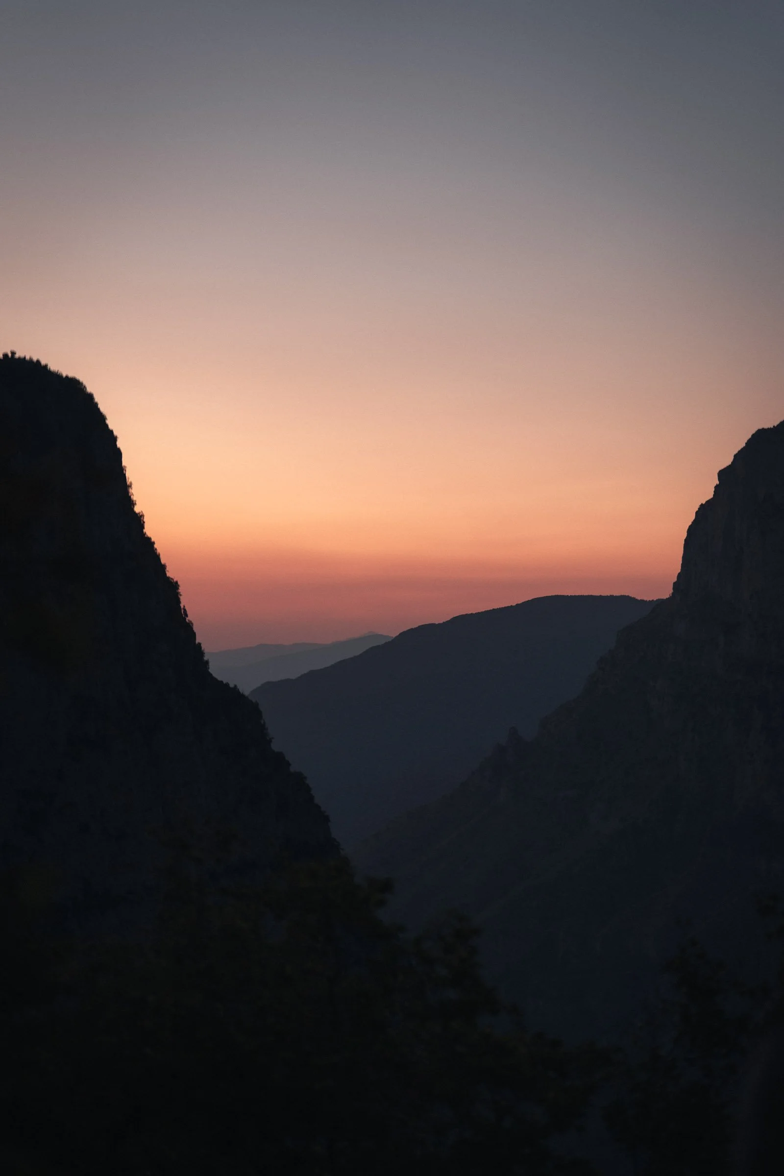 Sunset sky between the mountains of Vikos Gorge in Zagori.