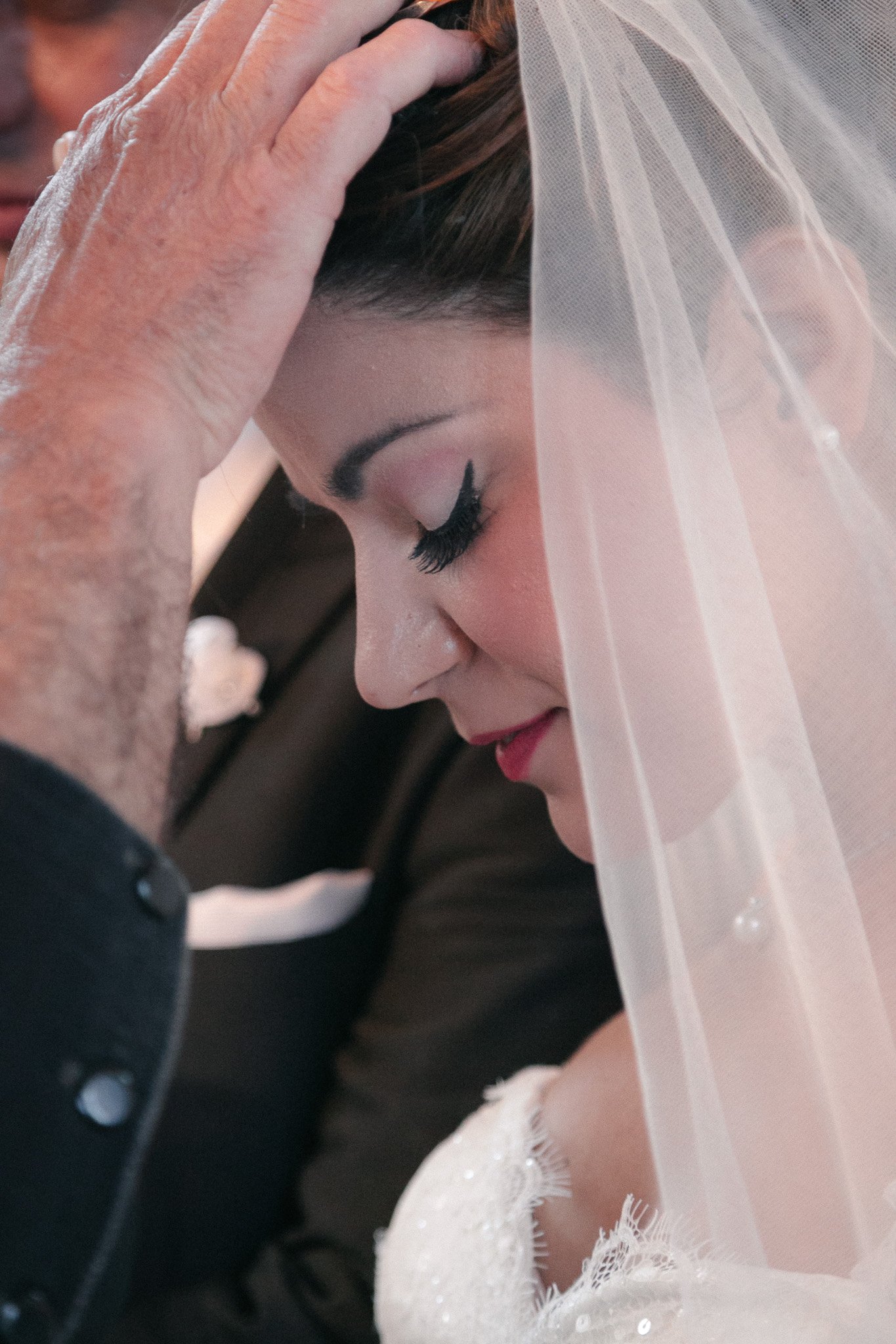Bride during ceremony, veil, close-up, Thesprotia - Alexandros Aidonis