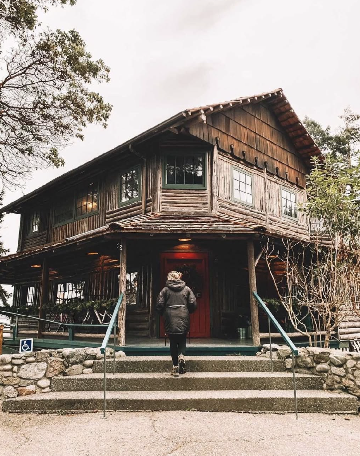 Walking up the steps to the main lodge at Captain Whidbey Inn