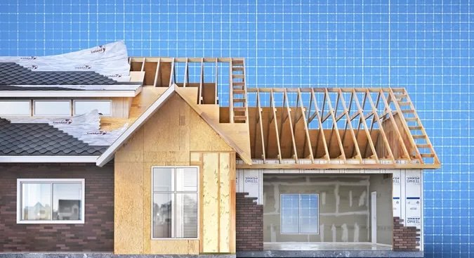 unfinished-frame-house-on-a-blueprint-background-3d-illustration copy.jpg