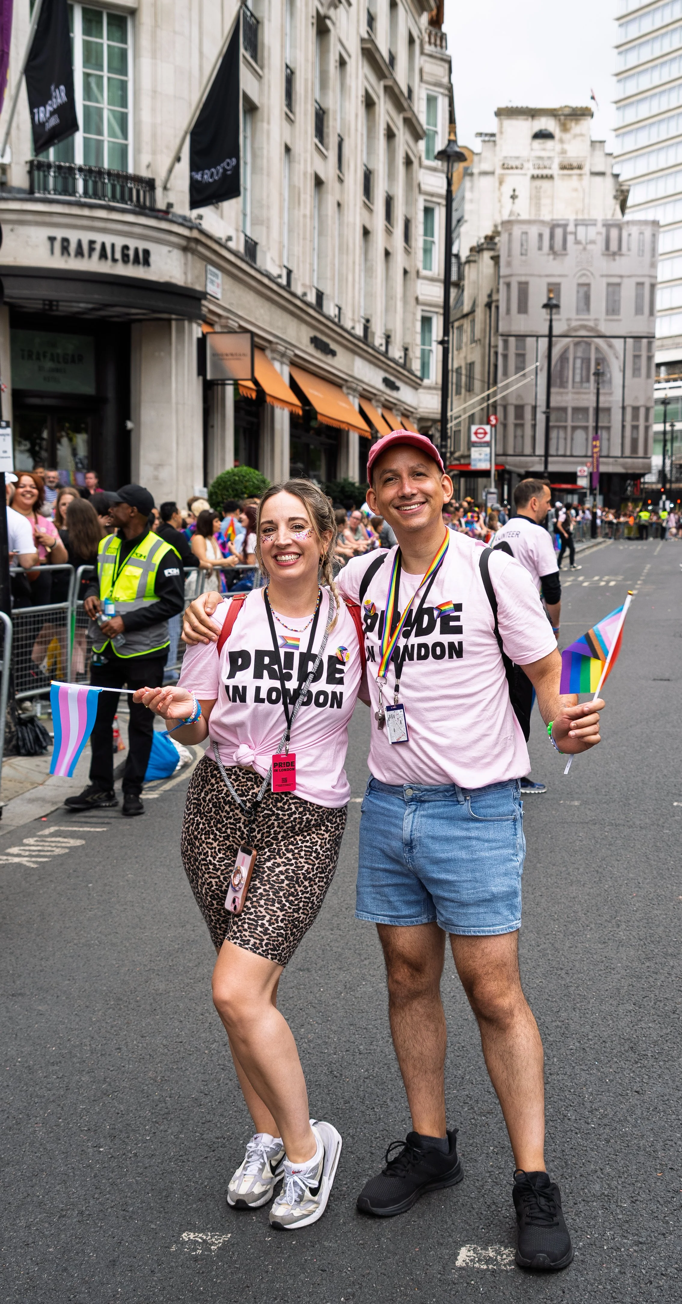 Two volunteer stewards within the Parade route