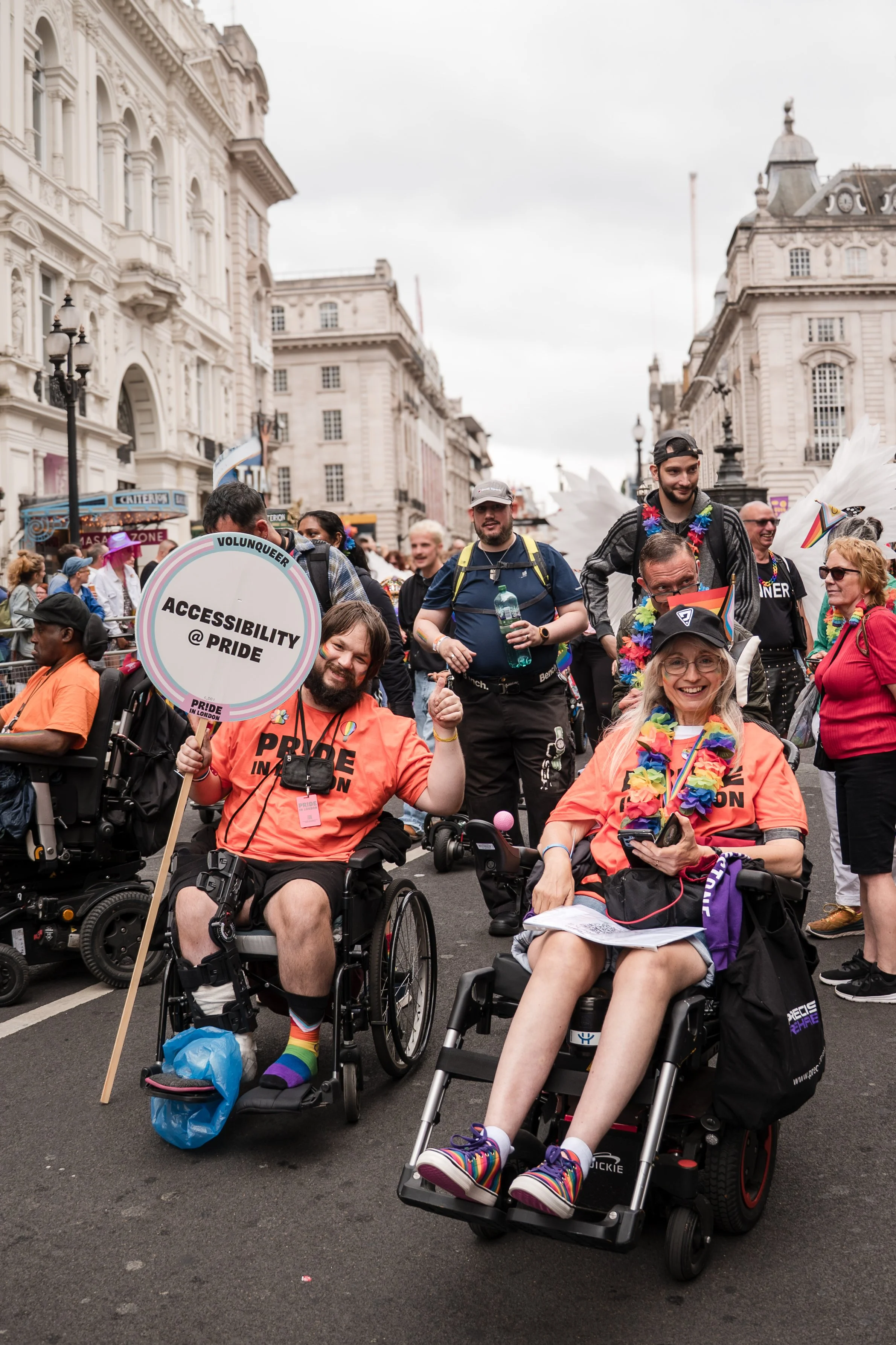 Volunteers from our accessibility team marching in the parade