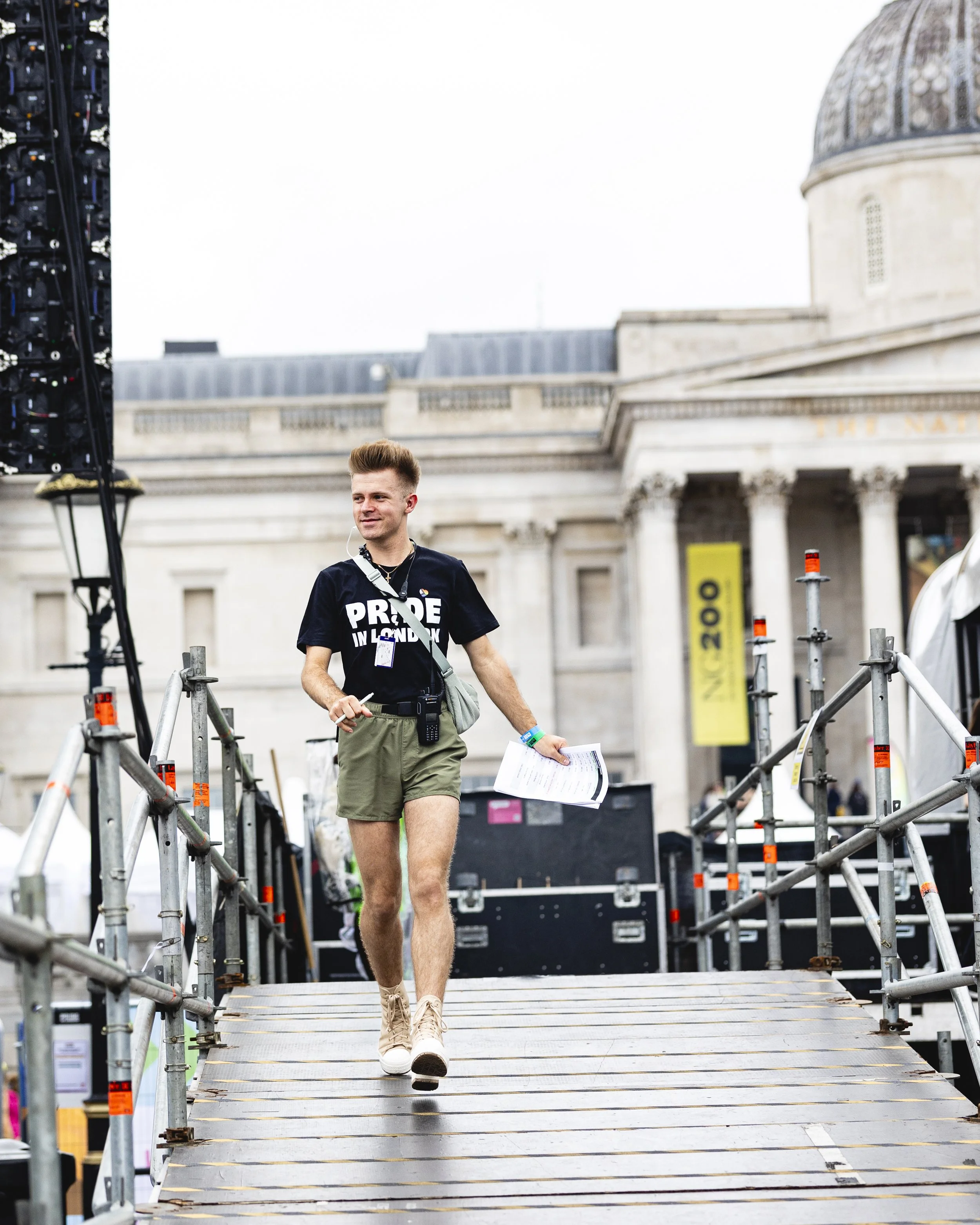 A Pride in London volunteer on our stages team