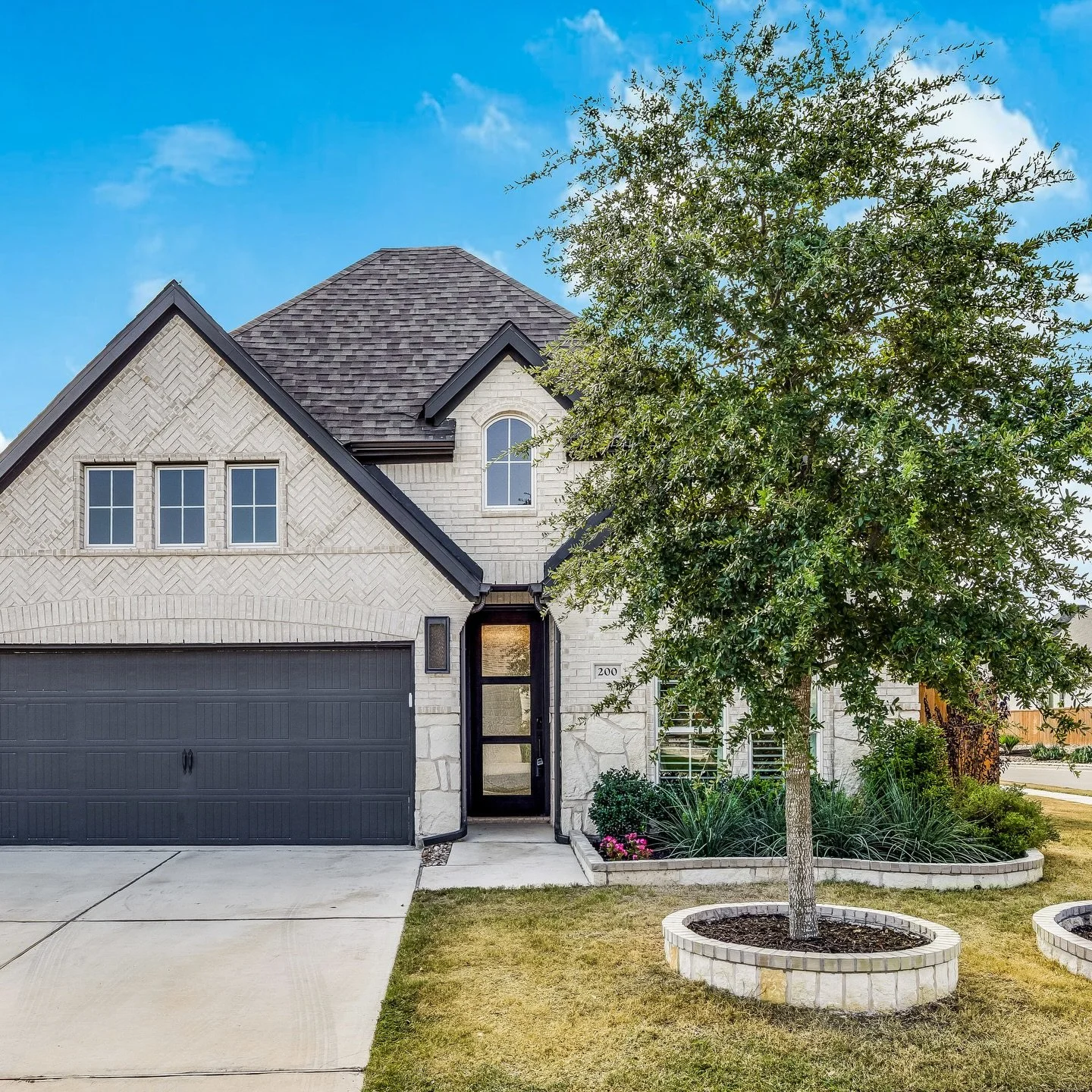 200 Green Knoll Lane
New price. Now offered at $499,000.

This light-filled 2022 Perry Home blends thoughtful design with everyday comfort, featuring a single-story four-bedroom layout and open views from front to back. The spacious kitchen with cent