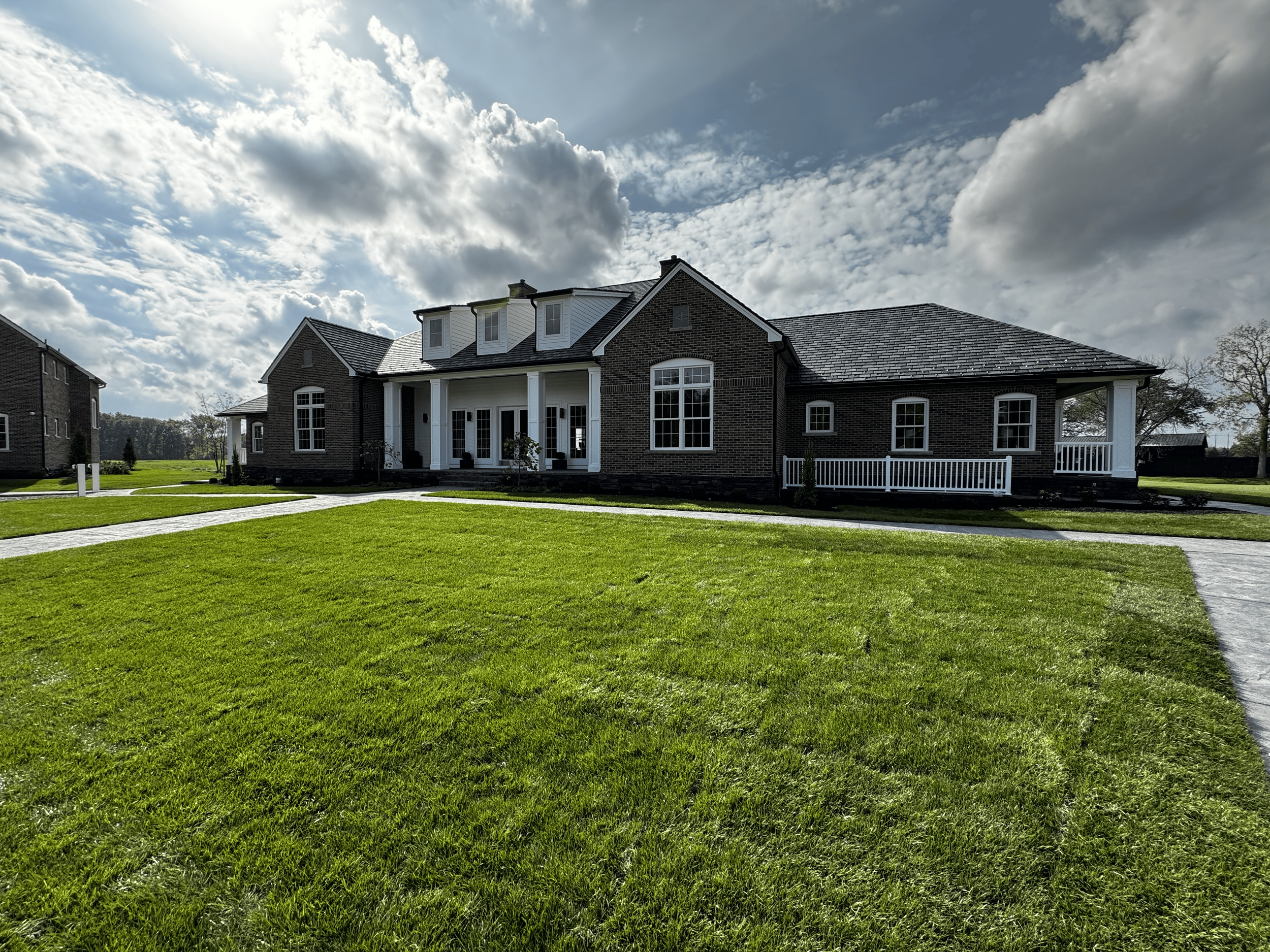 Residential yard with fresh sod provided by local sod growers.