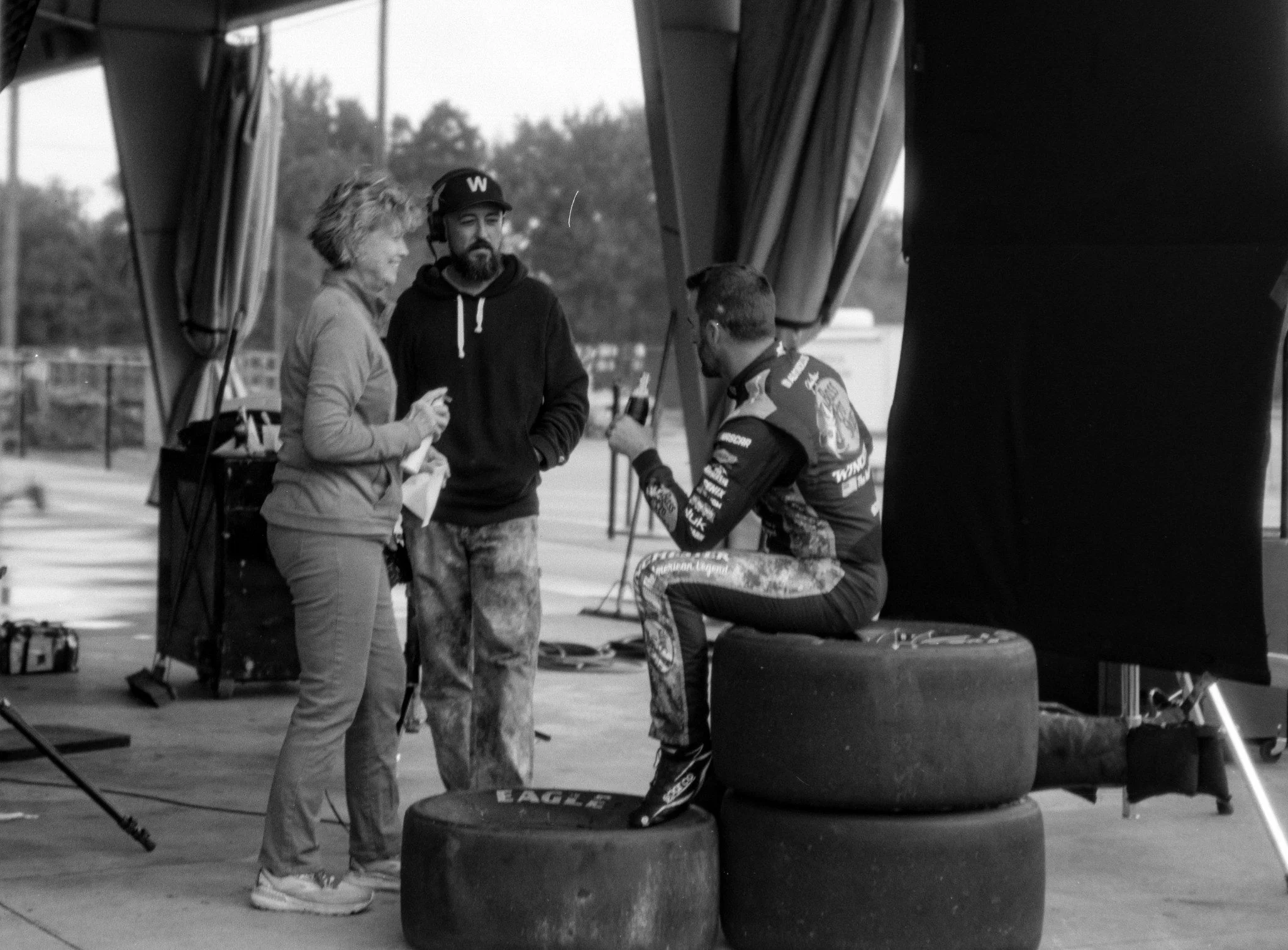 black and white BTS 2026 Nascar x coca-cola x hales photo jason and crew member with austin dillon