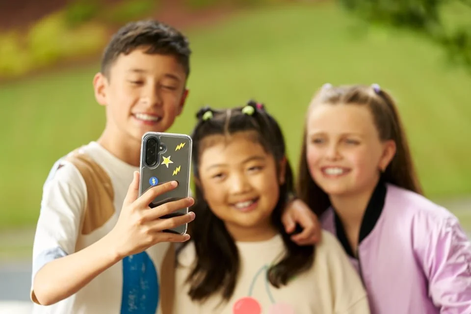 bark technology with hales photo video advertising campaign 3 kids with bark phone
