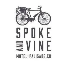 Logo of Spoke and Vine motel in Palisade, Colorado, featuring a vintage bicycle above the text.