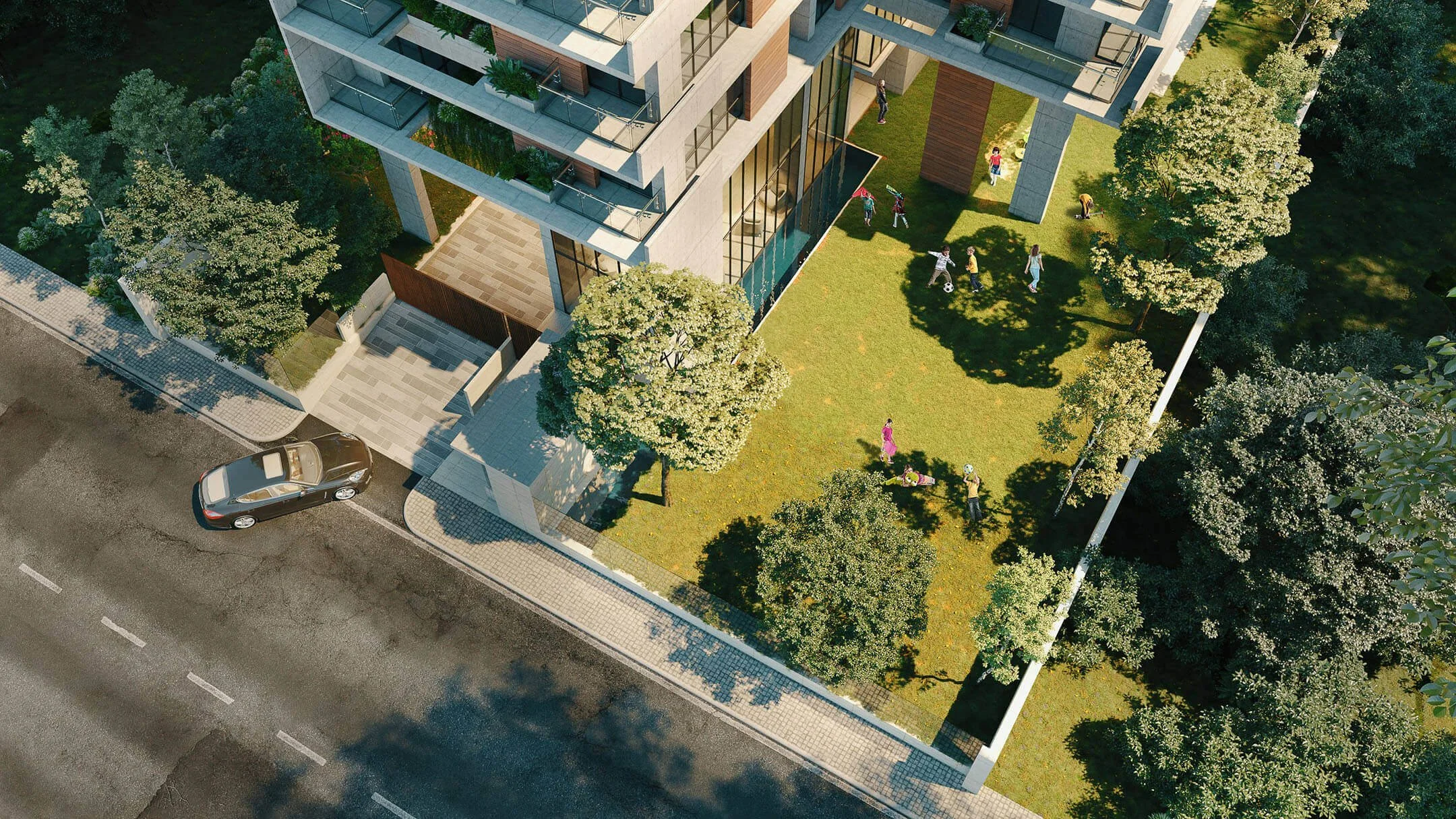 Newly Constructed development featuring a lush green landscape, residents and contemporary modern architectural design.
