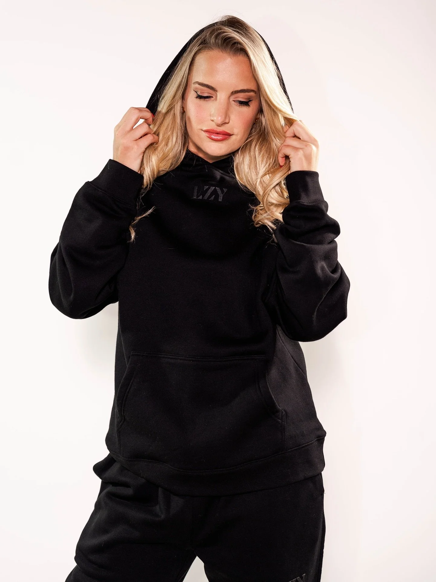 Stay cozy and stylish with our black on black LZY signature hoodie! 🖤✨ Featuring a bold puff print logo, this hoodie is the perfect blend of comfort and fashion. Elevate your streetwear game and make a statement wherever you go! #LZY #StreetStyle #S