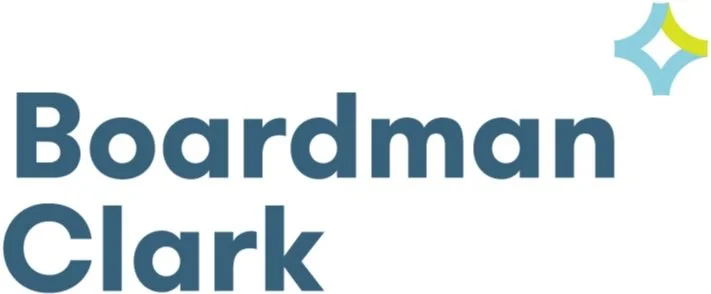 Logo with the text 'Boardman Clark' and a small decorative graphic of stars in light blue, green, and dark blue.