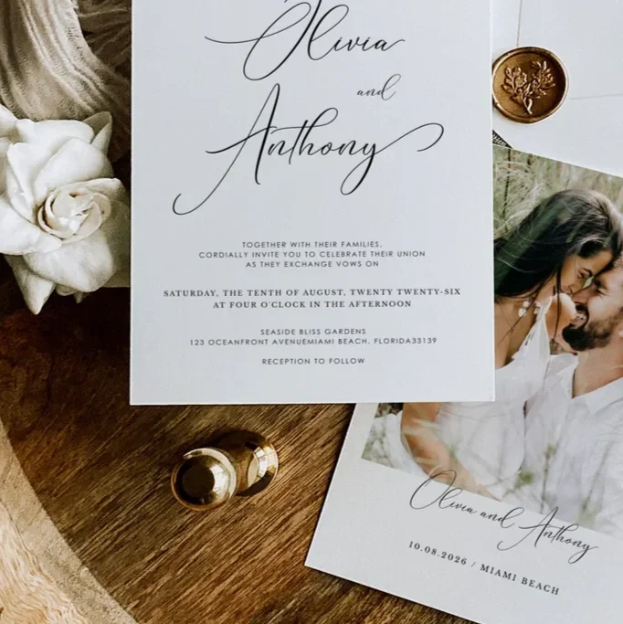 Coordinated wedding invitation suite with matching RSVP and details card featuring elegant script typography.