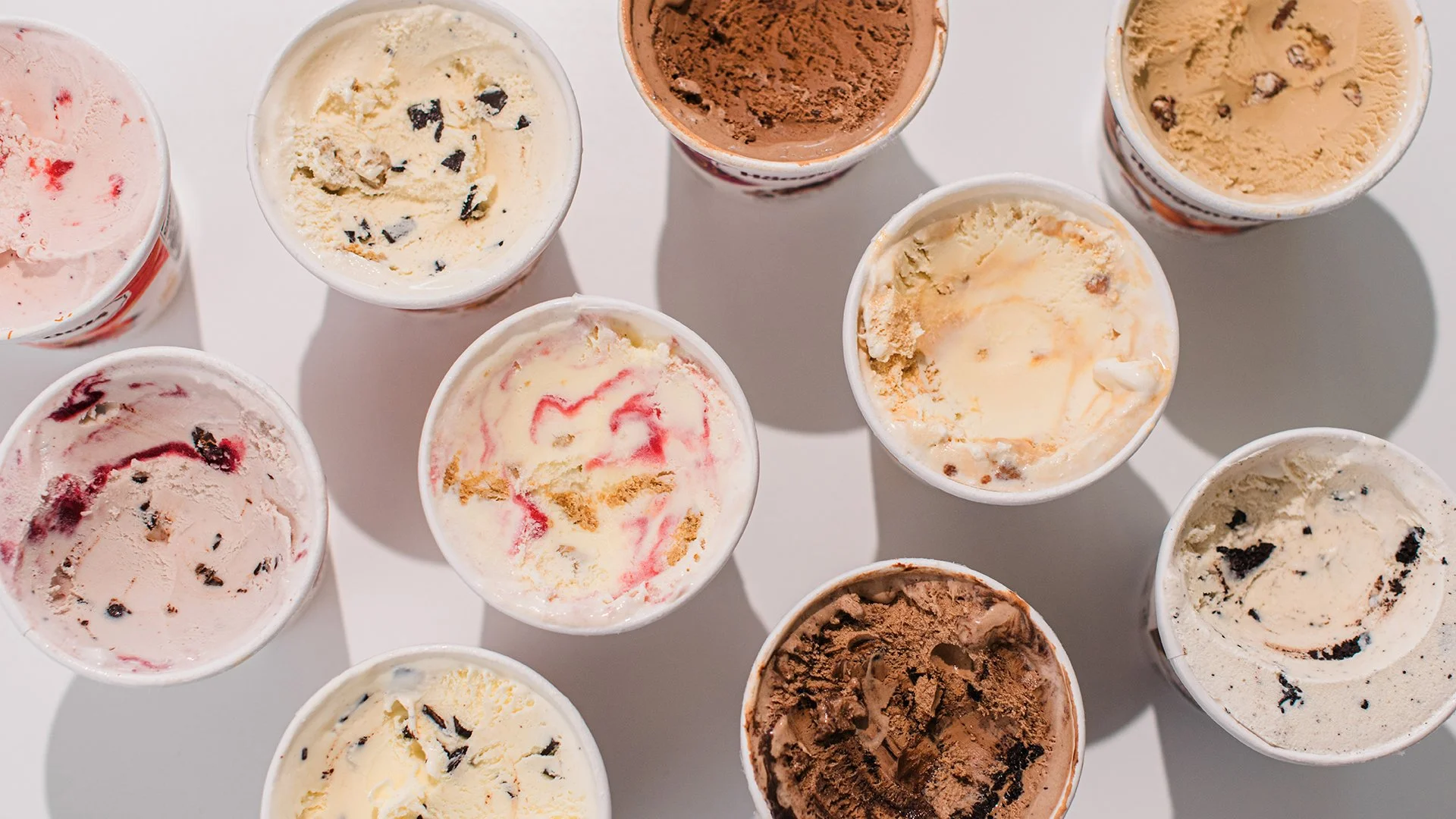 multiple pints of different flavors of ice cream