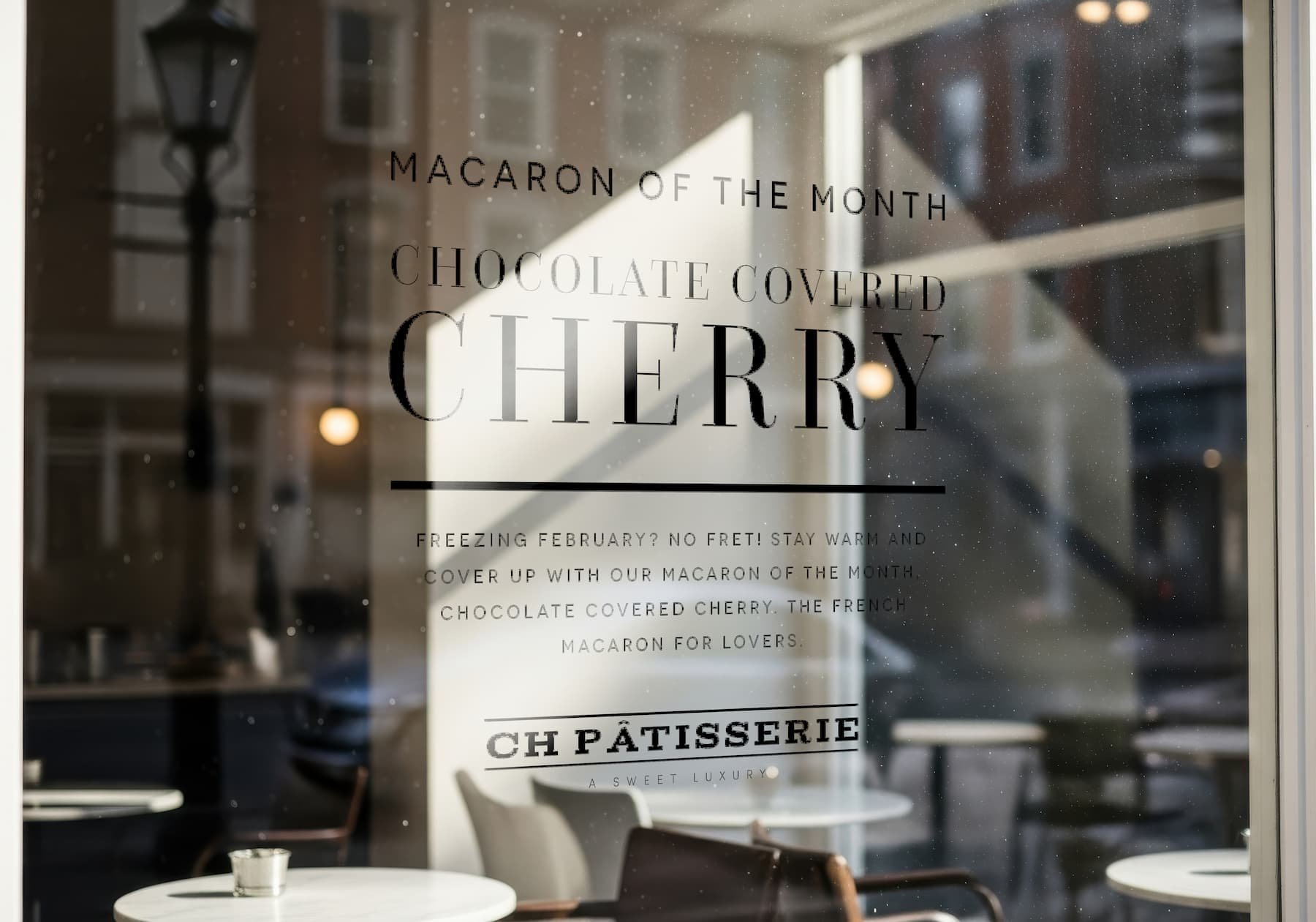CH Patisserie 'Macaron of the Month' window design.