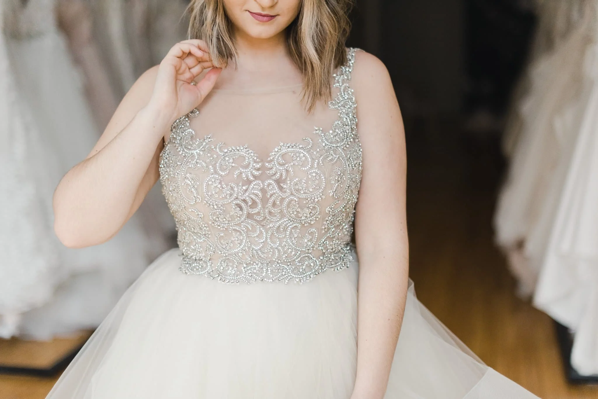 Top half view of women in bedazzled wedding dress