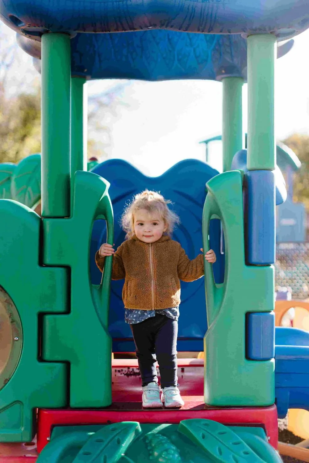 Little girl on playground.