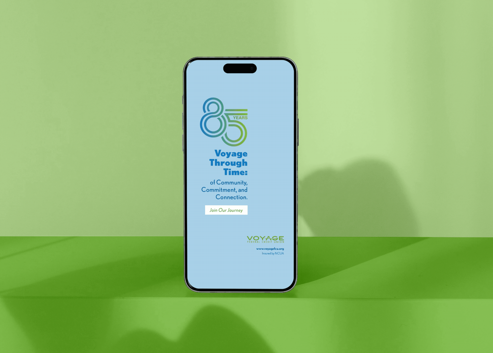 Voyage FCU 85th Anniversary campaign iPhone mockup