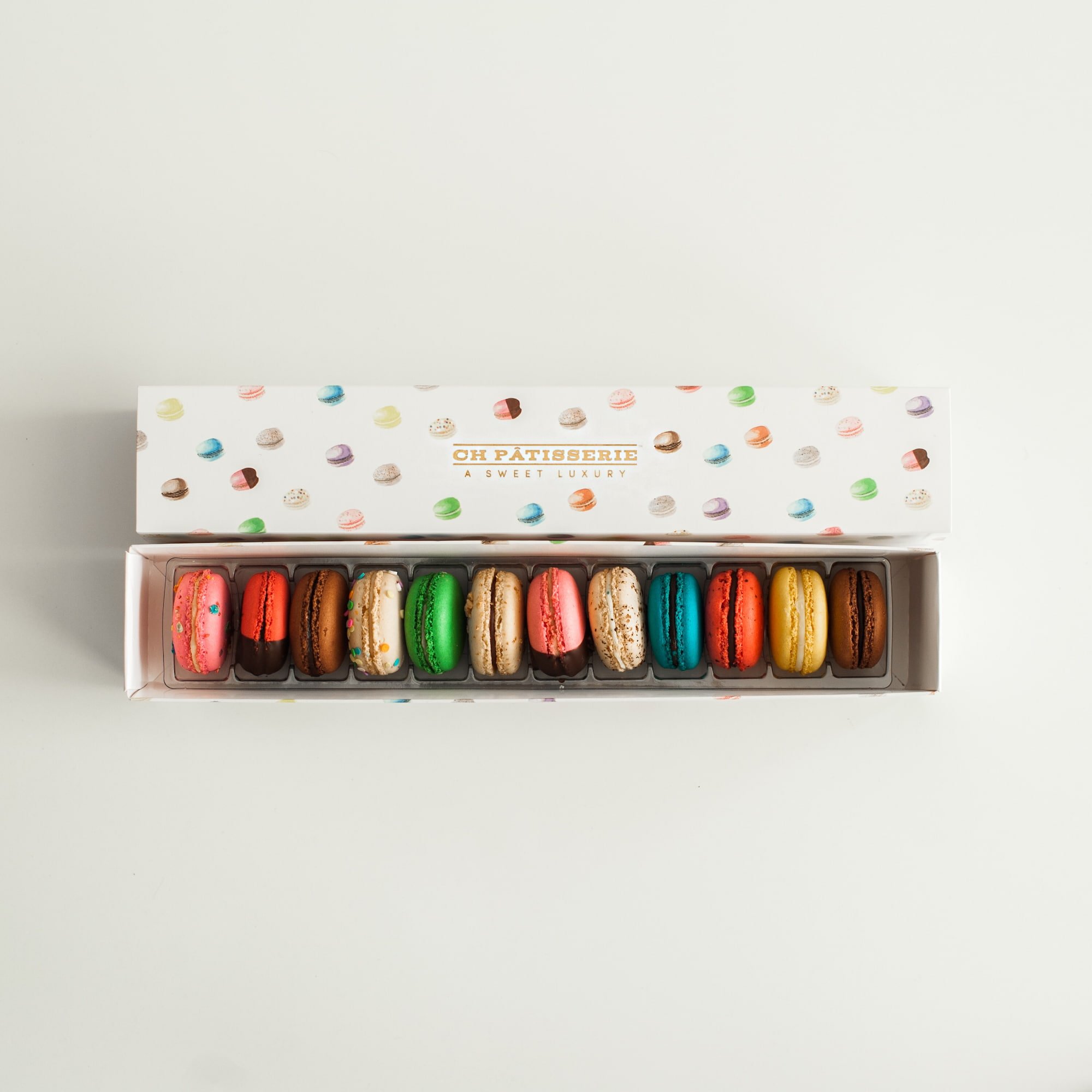 Box of multi color macarons.